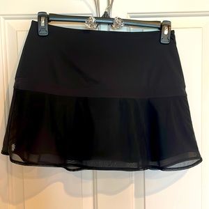 Athleta Black skirt with built in shorts mesh overlay Small